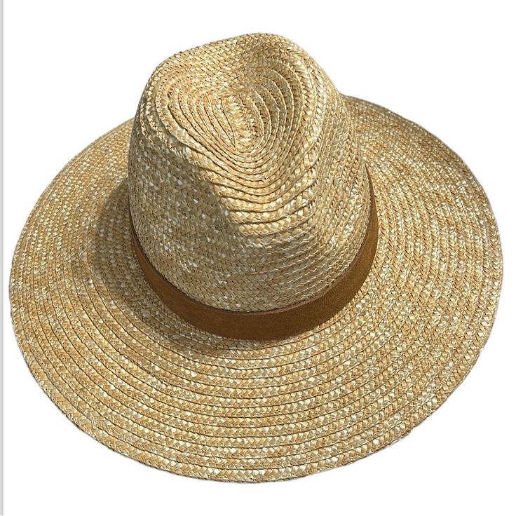 New With Tags 2020 No Flaws This Timeless Wheat Straw Fedora With A Wide Brim Makes For The Perfect Sun Hat. This Hat Offers Sun Protection + Keeps You Cool Throughout The Summer. The Isla Features A Camel Suede Band With Our Signature Xx Stitching On Back. Suede Band Is Sprayed With A Weather Protectant, But Is Not Waterproof. The Adjustable Straps Are Our Secret To Keeping Our Hats On Your Head Even On The Windiest Day. Trendy Leather Hats With Curved Brim, Beige Leather Hats With Curved Brim, Beige Leather Flat Brim Hat, Leather Hats For Beach In Summer, Leather Summer Hat For The Beach, Leather Wide Brim Straw Hat For Summer, Leather Hats For Summer Beach, Summer Leather Beach Hat, Chic Wide Brim Leather Hat