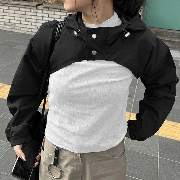 44570304151774|44570304184542|44570304217310 Trendy Long Sleeve Tops For Outdoor, Black Long Sleeve Sweatshirt With Drawstring, Long Sleeve Techwear Outerwear With Drawstring, Trendy Black Top For Outdoor, Trendy Long Sleeve Top With Adjustable Hood, Black Tops With Adjustable Hood For Spring, Black Drawstring Hooded Top For Outdoor, Trendy Hooded Top For Outdoor, Black Spring Tops With Adjustable Hood