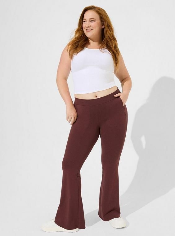 FIT Model is 5’10” wearing size 1. . High rise. 2” Signature Waistband sits perfectly against your curves. Flared leg. Full length. . 30” inseam. MATERIALS + CARE Thick cotton-blend fabric that smooths and flatters. 4-way stretch with great recovery. 95% cotton, 5% spandex. Machine wash cold. Dry low. Imported. DETAILS Opaque (not see-through). Functional pockets. . WHY WE LOVE IT Our best-selling leggings with our 2” Signature Waistband. Just like our best-selling original leggings, they're des Brown Dress Pants, Olive Green Pants, New Street Style, Swimming Outfit, Flare Leg Pants, Pocket Leggings, Matches Fashion, Black Dress Pants, Bra And Panty Sets