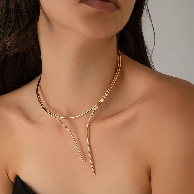 Minimalist Vivid Layers V-Shaped Choker Necklace necklaces LUNARITY GARAGE Gold Minimalist Party Choker Jewelry, Minimalist Party Choker, Minimalist Party Choker With Adjustable Chain, Minimalist Metal Choker Jewelry, Minimalist Snake Chain Clavicle Choker, Minimalist Party Choker Chain Necklace, Minimalist Metal Snake Chain Choker, Minimalist Y-shape Clavicle Chain Necklace, Minimalist Gold Choker For Party