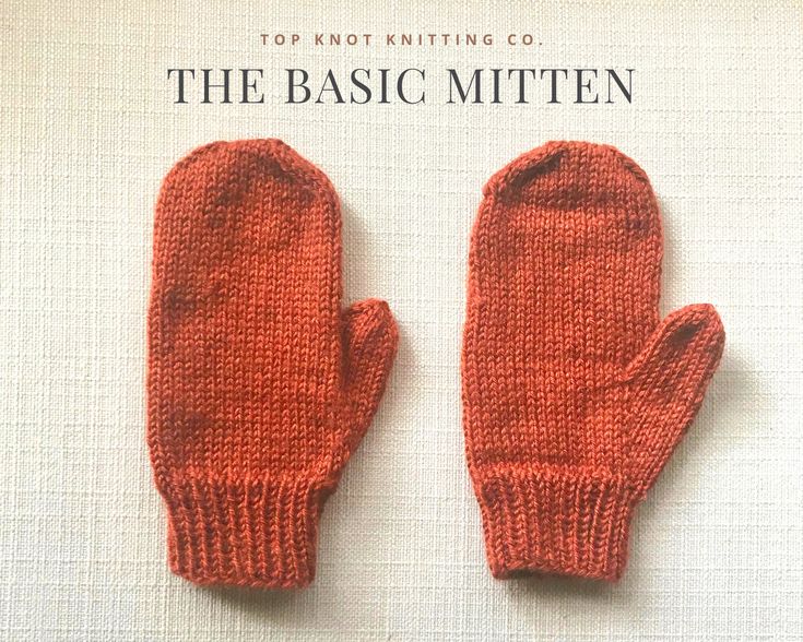 an orange knitted mitten sitting on top of a white sheet with the words, the basic mitten written below it