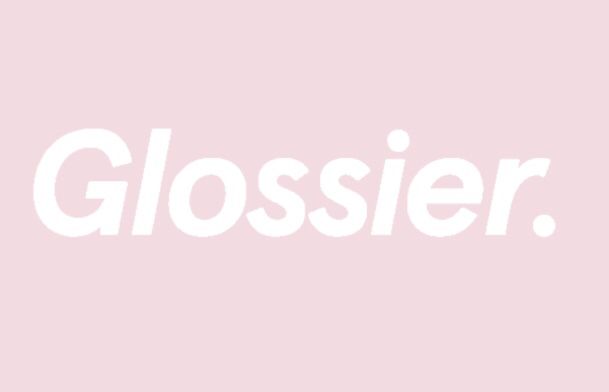 the word glossier written in white on a pink background