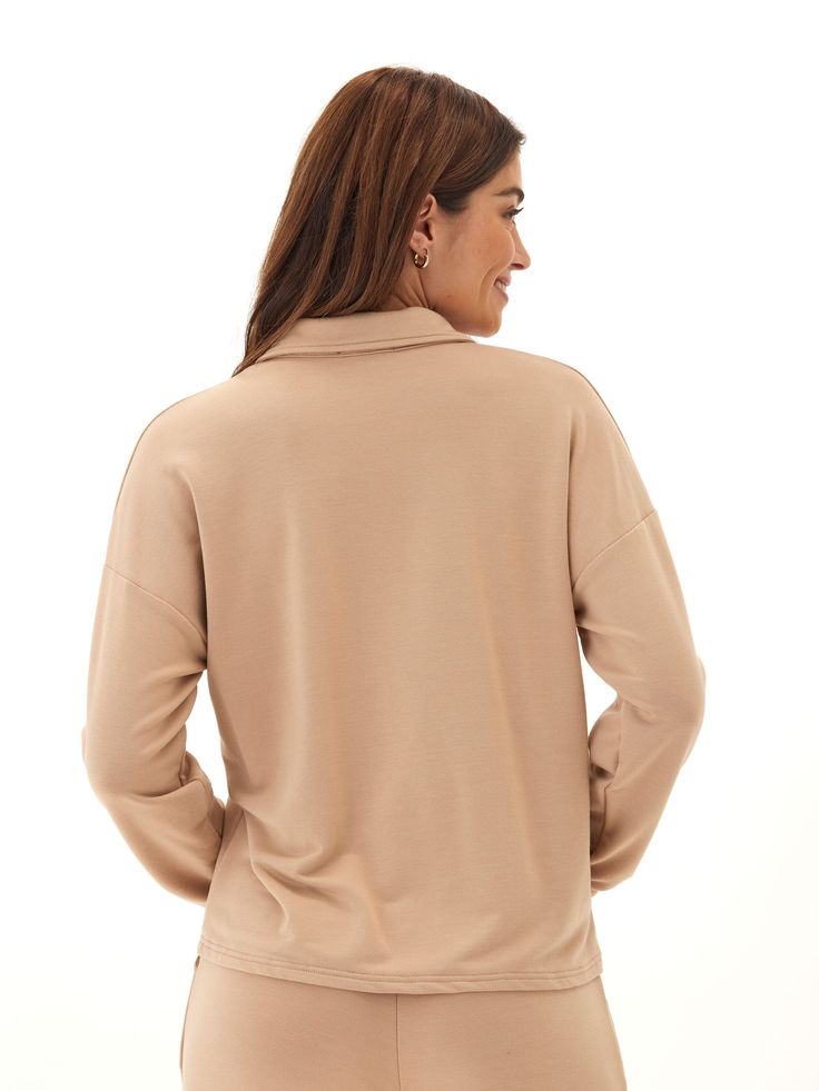 Indulge in ultimate comfort with our Eleanor Modal Terry Collared Top. Made with buttery soft fabric, this top offers a relaxed fit and a touch of sophistication with its collared detail. Perfect for elevating your lounge game, you'll never want to take it off! Versatile Solid Color Tops For Loungewear, Collared Plain Tops For Fall, Plain Collared Tops For Fall, Fall Plain Collared Tops, Chic Solid Blouse For Loungewear, Collared Loungewear Tops For Fall, Chic Solid Color Blouse For Loungewear, Chic Blouse For Loungewear, Collared Fall Loungewear Tops