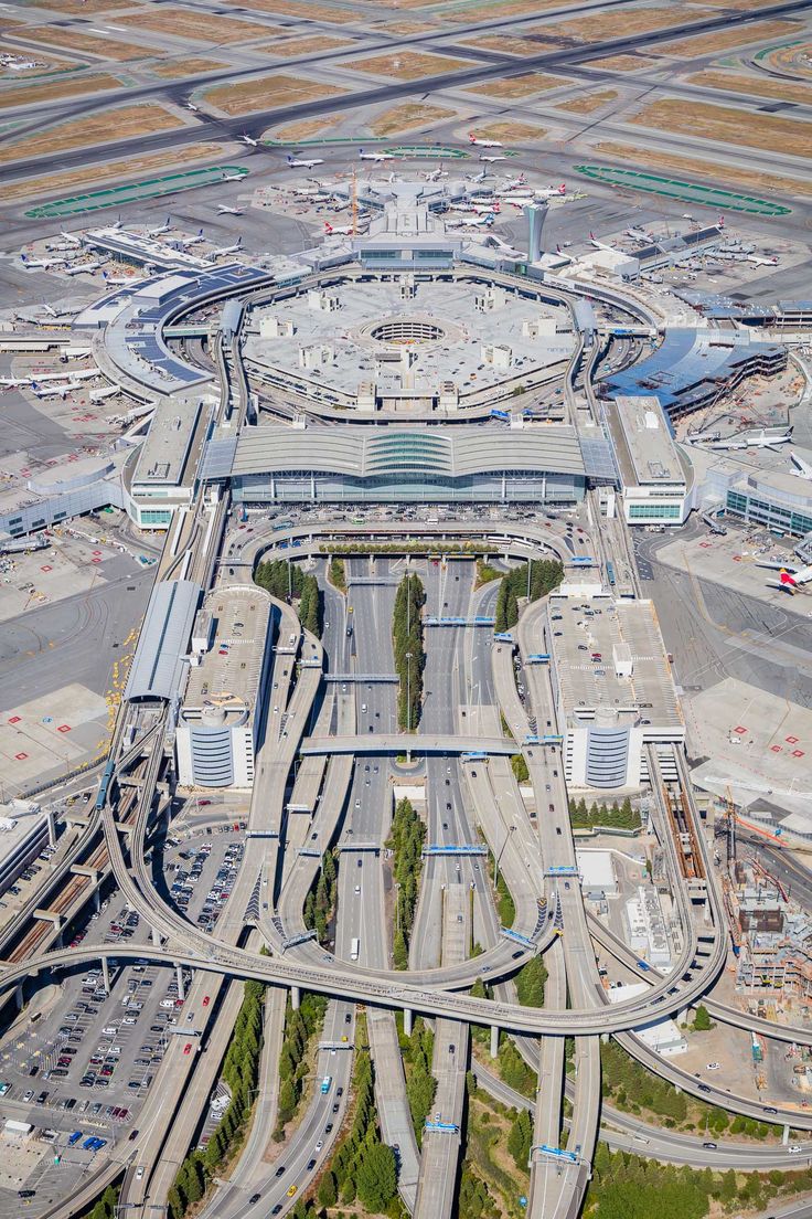 an aerial view of the airport with multiple lanes