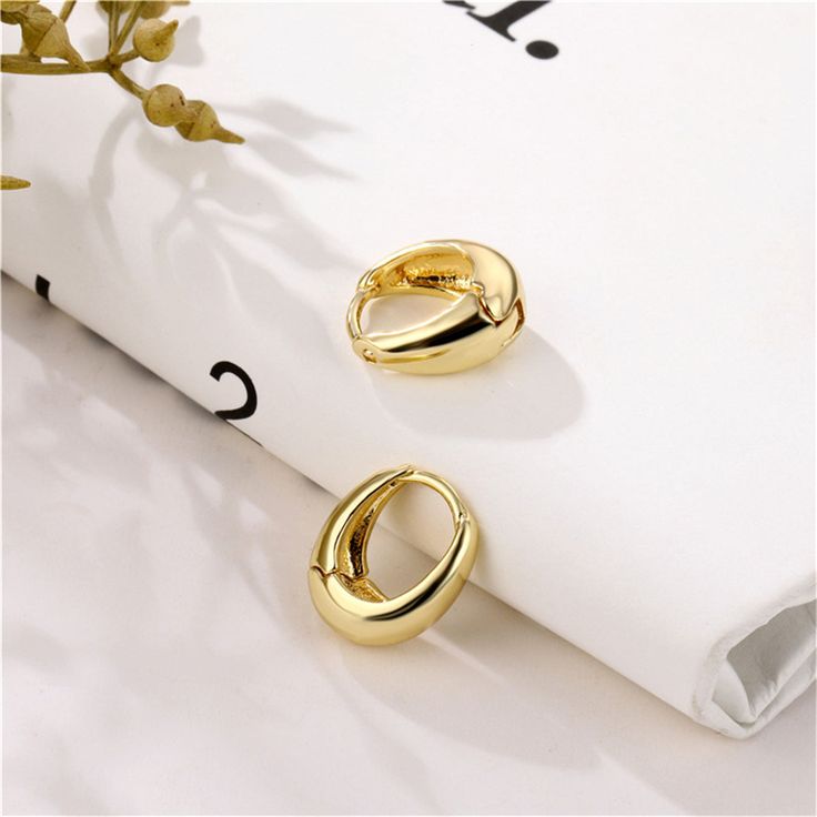 Frame your face with these trend-forward huggie earrings crafted in an 18k gold-plated material. 0.47" W x 0.55" L 18k gold-plated copper Korean Jewelry, Earring Crafts, Huggie Earrings, Cards Sign, Small Earrings, Metal Earrings, Circle Earrings, Gold Hoops, Huggies Earrings