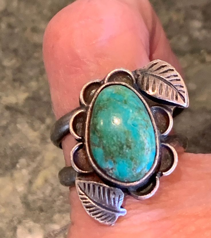 Purchased in 1970s in Arizona, turquoise stone set in silver scallops with carved leaves. Size 5. Excellent vintage condition. Vintage Turquoise Nickel-free Jewelry, Vintage Nickel-free Turquoise Jewelry, Vintage Adjustable Nickel-free Turquoise Ring, Adjustable Nickel-free Vintage Turquoise Ring, Adjustable Nickel Free Vintage Turquoise Ring, Adjustable Vintage Nickel-free Turquoise Ring, Vintage Stamped Jewelry, Vintage Turquoise Concho Ring, Vintage Turquoise Stamped Jewelry