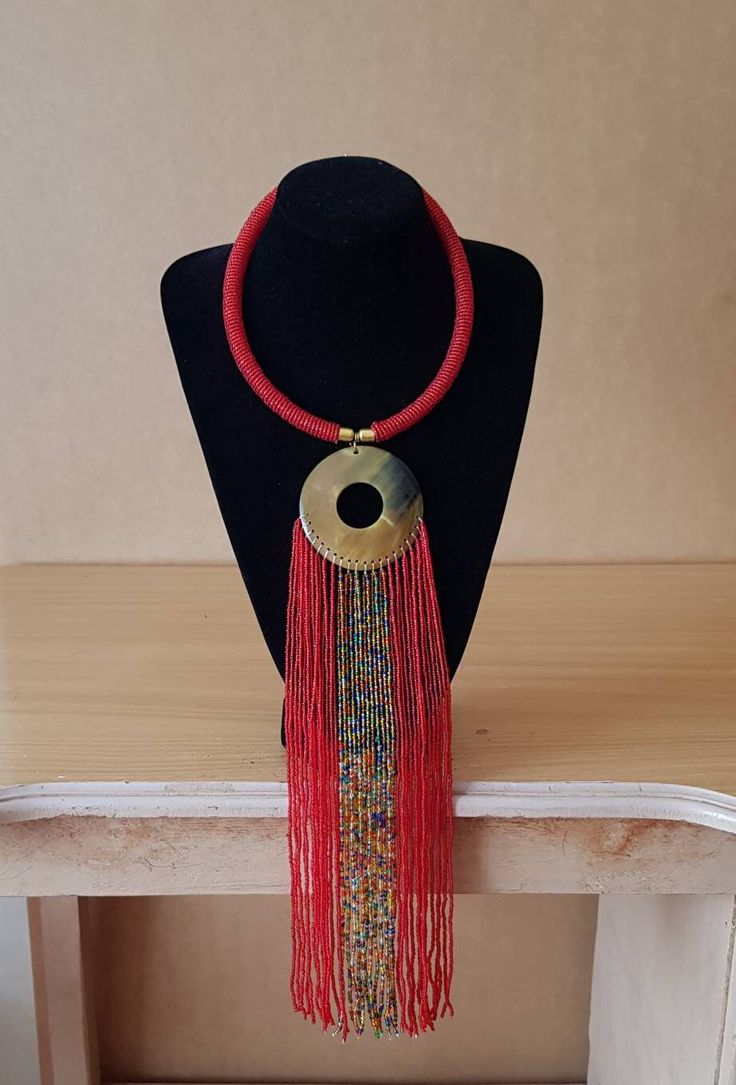 Beatiful women necklace. Main color: Red Available in different colors.  More necklaces here; https://www.etsy.com/shop/PrimeBeadsKe?ref=seller-platform-mcnav&section_id=33399833 All items are shipped through dhl express! Handmade Red Beaded Choker Necklace, Red Bohemian Choker Necklace, Red Large Beads Choker Necklace, Red Choker Necklace With Colorful Beads, Red Beaded Choker With Large Beads, Red Long Beaded Necklaces For Gifts, Handmade Red Beaded Necklaces With Round Beads, Red Choker With Large Round Beads, Handmade Red Choker Necklace