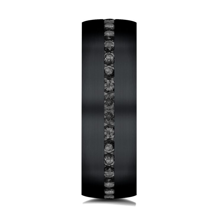 a tall black vase with skulls on it's sides and an intricate design in the middle