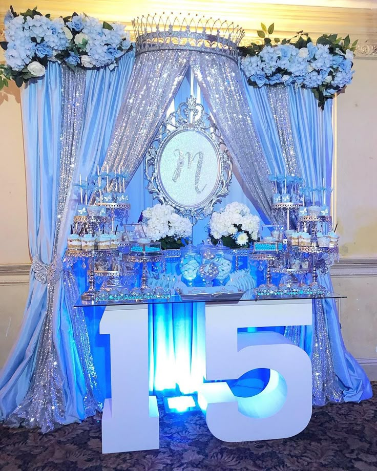 the table is decorated with blue and white flowers