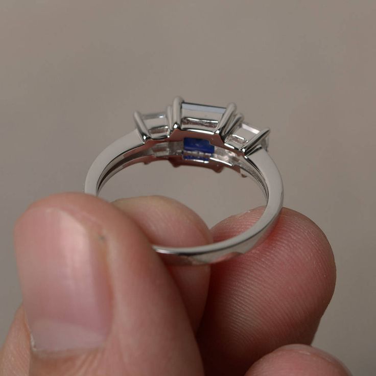 This is a gorgeous handmade creation. Its beauty is its simplicity & Elegance. The 6*6 mm princess cut faceted lab Sapphire is crafted in solid sterling silver and with rhodium plated. All item is sent in a beautiful gift box If you have any idea of design your ring,pls contact me directly. You can realize more lovely stuff clicking the link https://www.etsy.com/shop/knightjewelry?refshopsection_shophome_leftnav Please leave the correct address and you phone number for delivering successfull Princess Cut Jewelry With Accent Stones, Promise Ring With Princess Cut Brilliant Emerald, Fine Jewelry White Gold Square Cut Sapphire Ring, Promise Ring Emerald With Brilliant Princess Cut, Promise Princess Cut Birthstone Ring, Princess Cut Brilliant Emerald Ring For Promise, White Gold Sapphire Promise Ring Square Cut, White Gold Square Cut Sapphire Promise Ring, Square Cut Sapphire Ring In White Gold For Promise