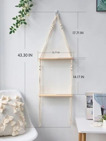 the measurements for a hanging shelf in a room with white walls and plants on it