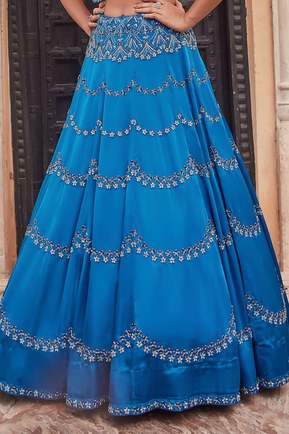 Prussian blue satin organza lehenga with an attached cancan and glass pipes, sequins and beaded hand embroidery. Comes with a padded blouse with an attached organza jacket. - Aza Fashions Formal Blue Anarkali Set With Zari Work, Elegant Blue Gown With Traditional Drape, Blue Semi-stitched Georgette Gown, Blue Semi-stitched Gown For Wedding, Blue Semi-stitched Anarkali Set For Formal Occasions, Formal Blue Semi-stitched Anarkali Set, Semi-stitched Blue Georgette Gown, Blue Floor-length Gown With Dupatta, Blue Silk Lehenga For Party