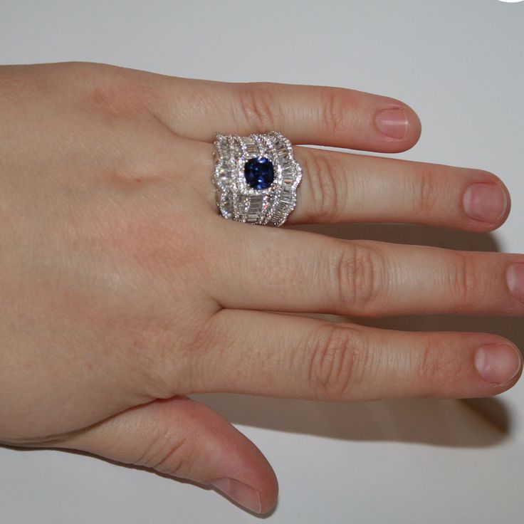 "Fancy Grandma Ring This ring is stamped 925, sterling. The stones are most likely CZs Size 7. Almost .75\" wide. Very well made ring, no stones are missing." Silver Cubic Zirconia Rings With Stone Setting, Silver Rings With Sapphire And Diamond Accents, Silver Sapphire Ring With Stone Setting For Formal Events, Formal Silver Sapphire Ring With Stone Setting, Silver Diamond Crystal Ring With Stone Setting, Elegant Silver Sapphire Ring With Stone Setting, Dazzling Silver Sapphire Ring With Diamonds, Silver Diamond Ring With Gemstone, Elegant Silver Birthstone Ring With Stone Setting