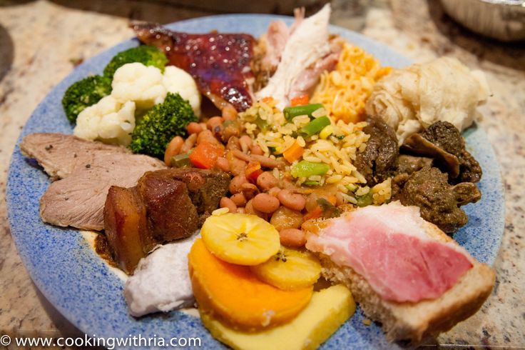 a blue plate topped with lots of different types of food