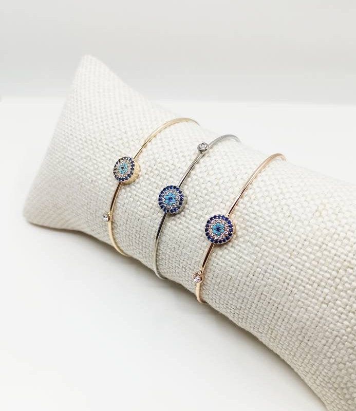 ⭐️Zirconia Evil Eye Bangle Bracelet is adjustable so it comfortably fits on any wrist. ⭐️Turkish jewelry is stainless steel. This evil eye charm bracelet is great for daily wear. For more evil eye bracelets, click the link below; https://www.etsy.com/shop/EyeDesignsbyGG?ref=search_shop_redirect&section_id=30219689 Adjustable Stackable Cubic Zirconia Diamond Bracelet, Adjustable Cubic Zirconia Beaded Bangle Bracelets, Adjustable Cubic Zirconia Cuff Bangle Bracelet, Cubic Zirconia Beaded Bangle Bracelet Gift, Adjustable Rose Gold Round Crystal Bracelet, Adjustable Round Rose Gold Crystal Bracelet, Resizable Cubic Zirconia Jewelry For Gifts, Beaded Cubic Zirconia Bracelet Gift, Silver Evil Eye Bracelet With Cubic Zirconia