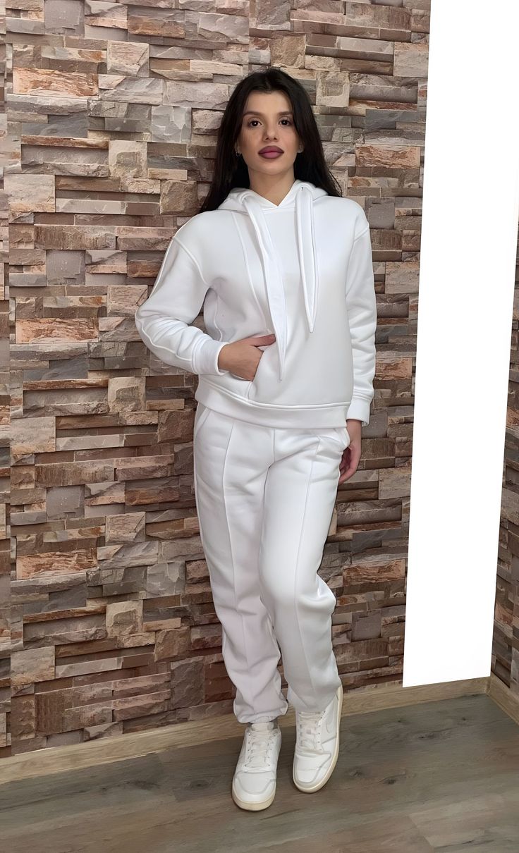 FREE STANDARD SHIPPING for all United State orders over $35* Two Piece Tracksuit Outfit with Hoodie and Pockets / Two Piece Athletic Set / Аthletic Wear / Athletic Pants / Athletics Hoodie Three-piece set. High-waisted trousers with built-in elastic. Side pockets and wide legs. Impressive crop top with short sleeves and a round neckline. Comfortable blouse with a loose silhouette. Wide, loose sleeves and turtleneck. Asymmetric hem. Materials: cotton This dress is perfect for different events, parties, dinners and hangouts. ♥ THE PERFECT GIFT FOR YOUR LOVED ONE ♥ ♥ All garments are handmade in our little Boutique in a special UNIQUE way ♥ Different sizes available. Check the listing for your size. * SOME PLUS SIZES ARE ALSO AVAILABLE SIZE CHART How to measure yourself * Bust: * Use a flexib Solid Color Sporty Tracksuit With Pockets, Hooded Tracksuit With Pockets For Jogging, Solid Color Athleisure Tracksuit With Pockets, Sporty Tracksuit With Ribbed Cuffs, White Moisture-wicking Tracksuit For Gym, Tracksuit For Jogging With Ribbed Cuffs, Tracksuit With Ribbed Cuffs For Jogging, Sportswear Tracksuit With Hoodie For Jogging, Hooded Activewear With Pockets For Jogging