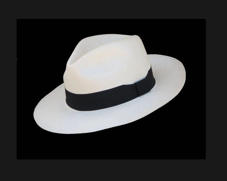 The classic for the gentleman  -  in timeless elegance. Trendy and stylish also for the lady. A touch of elegance of days long gone by which add every outfit a certain coolness. Fineness of weave:   Fino fino, Extra Fine Weave - approx. 21 weaves per inch The high quality and enjoyable wearing comfort make the Panama hat the most popular summer hats. People from all over the world are always amazed by our unique pieces of art made of natural Toquilla-straw.          *        Airy, breathable and durable - approx. 100 grams light          *        100% Toquilla-straw          *        Comfortable protection from the sun's UV-rays          *        Handsigned by the weaver          *        Certificate of authenticity - certifies the genuineness of your Panama hat          *        Antipersp White Flat Brim Fedora For Formal Occasions, Elegant Wide Brim Toquilla Straw Fedora, Classic Panama Hat With Short Brim, Elegant Fedora Panama Hat In Toquilla Straw, White Panama Hat With Curved Brim For Formal Occasions, White Curved Brim Panama Hat For Formal Occasions, Formal White Panama Hat With Curved Brim, Elegant Boater Hat With Curved Brim In Toquilla Straw, Classic Panama Hat With Flat Brim