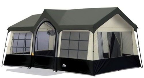 a tent with windows and curtains on it