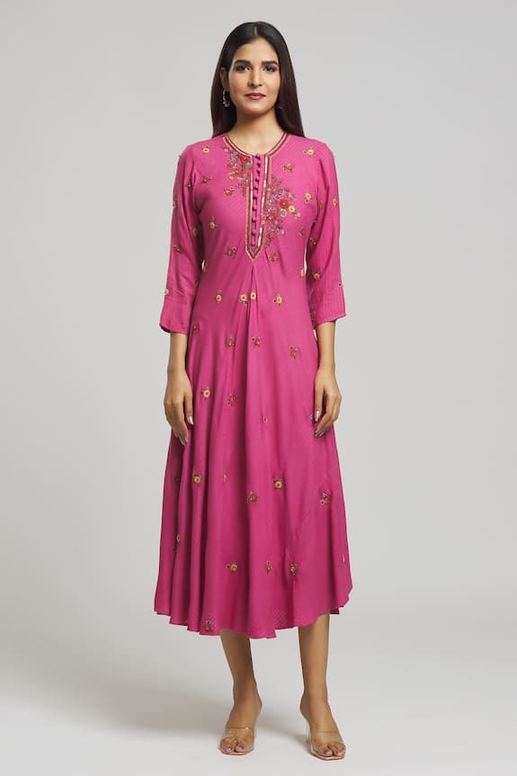 Magenta kurta with sequin and bead embroidered floral patterns on a textured base. - Aza Fashions Festive Embellished Embroidered Dress, Embellished Straight Kurta Dress, Embellished Embroidered Dress For Eid Designer Wear, Bollywood Embellished Embroidered Dress For Eid, Traditional Embellished Dress With Straight Kurta Shape, Festive Anarkali Embellished Embroidered Dress, Traditional Embellished Embroidered Dress For Reception, Embroidered And Embellished Fabric For Designer Wear During Navratri, Embroidered Dress For Diwali Reception With Intricate Embroidery