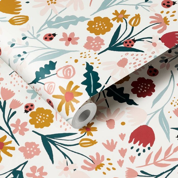 a floral wallpaper with flowers and ladybugs in pink, orange, yellow and blue