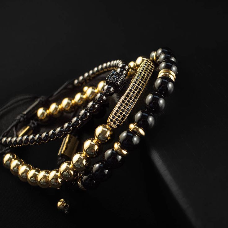 Chase your luck with the Vegas bracelet stack! The Vegas stack features trifecta of beaded beauties - black onyx, golden glitz, and rhodium PVD for a triple threat of style. Plus, a lucky dice and CZ bar for a dash of extra luck. Indulging the adventurous spirit and wandering heart that lives within all of us, our men's bracelet stacks have been crafted to provide a touch of class to your wardrobe throughout the year. Each exquistely curated stack includes a mix of spiritually healing gemstones Adjustable Black Bracelets With Gold Beads, Adjustable Gold Stacked Beaded Bracelets, Adjustable Stacked Gold Beaded Bracelets, Luxury Gold Jewelry With Black Beads, Luxury Adjustable Stackable Tennis Bracelet, Adjustable Stacked Black Beaded Bracelets, Elegant Adjustable Stacked Beaded Bracelets, Luxury Adjustable Black Wristband, Luxury Black Jewelry With 8mm Beads