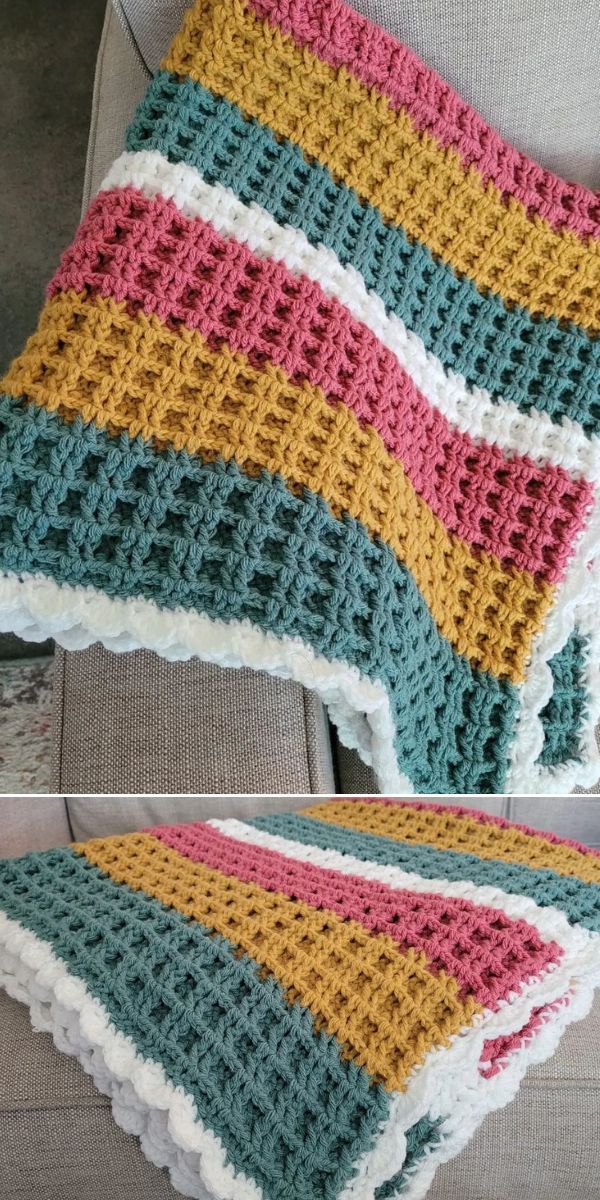 crocheted blanket made with multicolored yarn on the back of a couch