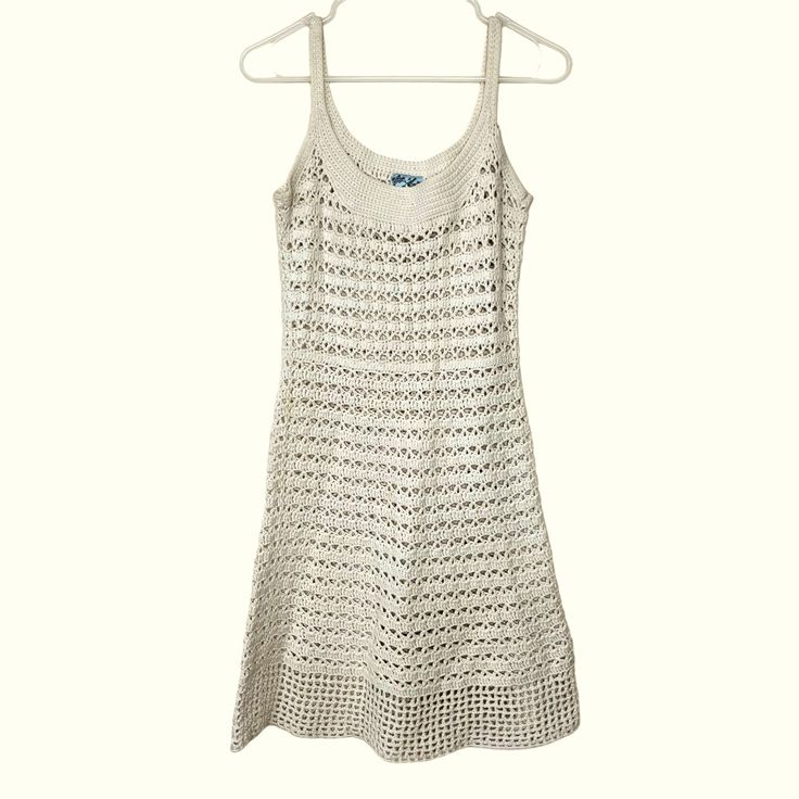 Tabitha Anthropologie Cream Crochet Knit Sleeveless Dress- Small Turn Heads And Radiate Confidence In This Crochet Knit Sleeveless Dress. It's A Wardrobe Essential That Effortlessly Captures The Essence Of Timeless Fashion With A Modern Twist. Embrace The Charm Of Artisanal Craftsmanship And Make A Statement Wherever You Go. Get Yours Today And Experience The Allure Of Handcrafted Elegance. Bust- 15" Waist- 13" Length Shoulder To Hem -36" Care- Dry Clean Very Good, Preloved And Preworn Condition Fitted Sleeveless Crochet Dress With Lace Trim, Sleeveless Crochet Lace Sundress, Sleeveless Crochet Lace Dress For Summer, Casual Sleeveless Crochet Dress For Spring, Sleeveless Pointelle Knit Crochet Top For Vacation, Sleeveless Pointelle Knit Crochet Beach Dress, Sleeveless Pointelle Knit Crochet Dress For Beach, Vacation Sleeveless Crochet Top With Pointelle Knit, Sleeveless Crochet Top With Pointelle Knit For Vacation