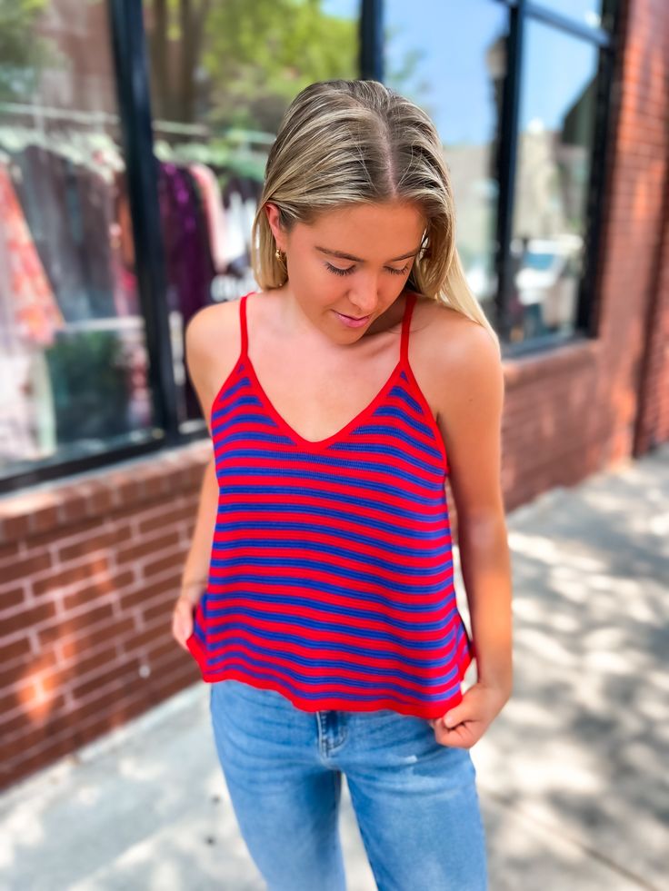 Step up your game day attire with our Striped Flare Cami in Cherry! Made for KU game days with its bold and vibrant stripes. Show off your team spirit in style with this must-have piece that will elevate any outfit. Get ready to cheer loud and proud! GO JAYHAWKS!!! Sporty Striped V-neck Top, Multicolor Striped Top For Summer, Sports Fan Tops For Game Day In Spring, Summer Sports Tops With Contrast Stripes, Summer Sports Top With Contrast Stripes, Striped Collegiate Tops For Game Day, Sporty Summer Tops With Contrast Stripes, Sporty Tops With Contrast Stripes For Summer, Sporty Contrast Stripes Tops For Summer