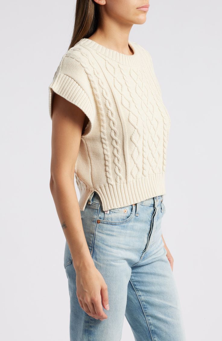 A layering essential, this creamy sweater is knit from soft organic-cotton yarn with textural cable stitches. Crewneck Short sleeves 100% organic cotton Dry clean Imported Cotton Pointelle Knit Sweater For Layering, Cotton Cable Knit Top For Fall, Cable Knit Tops For Layering With Relaxed Fit, Fall Cotton Cable Knit Top, Relaxed Fit Cable Knit Top For Layering, Crew Neck Cable Knit Top, Cable Knit Crew Neck Top, Fall Cable Knit Cotton Top, Cotton Cable Knit Sweater For Layering