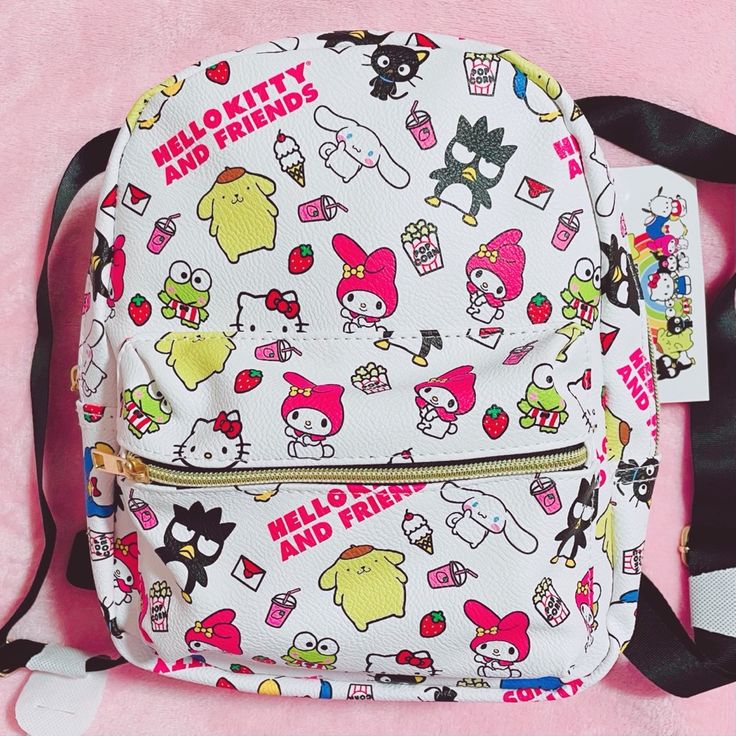 This Is A Sanrio Hello Kitty And Friends Small Cute Backpack The Dimensions Are Length Is 8 Inches 11 Inches Tall Width Is 3 Inches It Is Brand New With Tags And In Great Condition. It Has No Damages, No Signs Of Wear, And No Tears I Ship Within 1-3 Days Excluding Sundays And Holidays From A Smoke-Free House White Harajuku Backpack For Back To School, Back To School Harajuku Style White Backpack, White Harajuku Style Backpack For Back To School, Kawaii White Backpack For Everyday Use, White Kawaii Backpack For Everyday Use, White Harajuku Backpack For Daily Use, White Harajuku Style Backpack For Daily Use, Playful Hello Kitty Backpack, Playful Hello Kitty Print Backpack