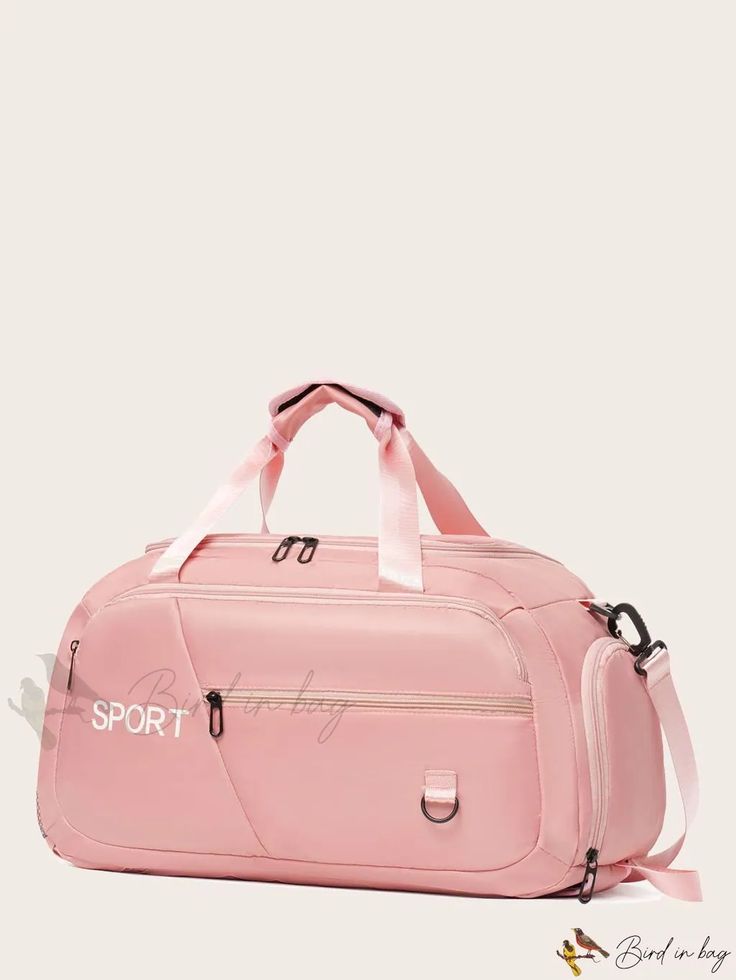 a pink duffel bag sitting on top of a white floor next to a wall