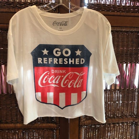 Coca Cola Tee Shirt White T-shirt With American Flag Print For Spring, Casual Red T-shirt With American Flag Print, Red Tops With American Flag Print For Spring, Red Flag Print T-shirt For Spring, American Flag Print Relaxed Fit Graphic Tee, American Flag Print Graphic Tee With Relaxed Fit, American Flag Print Crew Neck Top For Spring, Patriotic Red Shirt For Spring, Red Casual T-shirt With Flag Print