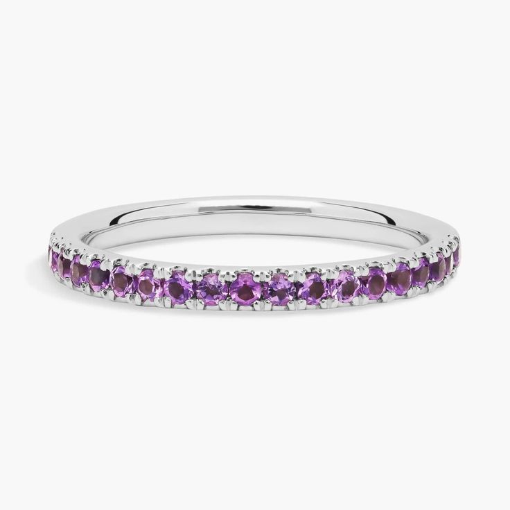 A dainty row of brilliant round amethysts in vivid purple are pave set in this Riviera ring crafted of 14k white gold. A sweet sentiment on its own, or a shimmering statement when stacked with other gemstone and diamond bands from the Riviera collection. Precious Gemstones Jewelry, Ring Crafts, Amethyst Ring, Diamond Bands, Semi Precious Gemstones, Fashion Rings, Types Of Metal, Gemstone Jewelry, Jewelry Rings