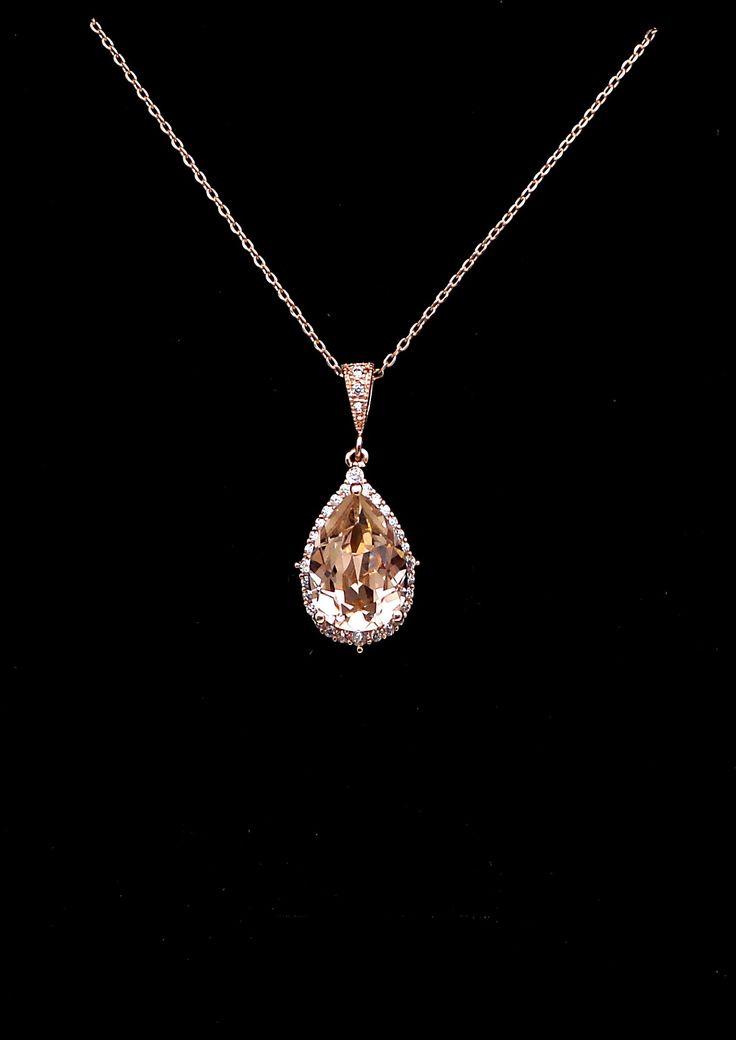 Tarnish resistant rose pink gold plated metal framed teardrop luxury genuine Best high-quality designer brand vintage rose blush pink foiled back rhinestone teardrop and rose pink gold plated metal bail with cubic zirconia deco. Comes with 16 or 18 inch rose gold plated sterling silver chain.    Pendant size with bail : 3cm x 1.4cm Matching earrings and bracelet available and sold separately. https://www.etsy.com/listing/628917580/wedding-jewelry-bridal-earrings?ref=shop_home_active_85&pro=1&frs Gold Necklace Vintage, Necklace Fancy, Swarovski Pendant, Wedding Bridesmaid Jewelry, Rose Blush, Jewelry Bridesmaid, Rose Vintage, Wedding Bridal Jewellery, Wedding Jewellery Necklace