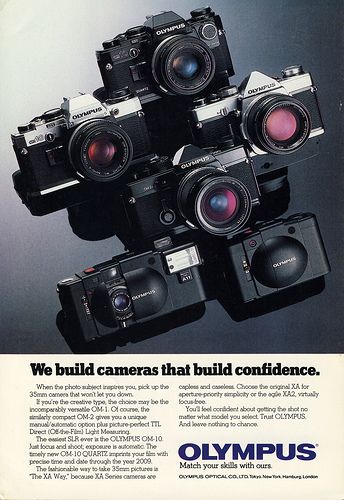 an advertisement for the camera company showing five cameras stacked on top of each other with caption that reads, we build cameras that build confidence