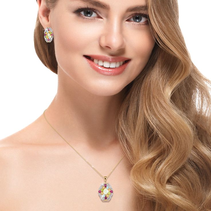 A celebration of artistry and color. Finely crafted from sterling silver, finished in 18k yellow gold, this ornate ensemble is a testament to your timeless style. An intricate arrangement of colorful gemstones, each chosen for its unique charm creates a charming focal point. An opulent Opal sits at the heart, surrounded by radiant Rhodolites, warm Citrines, refreshing Peridots and serene Blue Topaz. The dynamic interplay of hues creates a mesmerizing kaleidoscope that captures attention and sparks conversation. Embrace the enchantment of this collection and let your style speak volumes with every step. Fine Jewelry With Oval Jeweled Details, Oval Jeweled Fine Jewelry, Fine Jewelry With Jeweled Oval Details, Exquisite Multicolor Oval Jewelry, Elegant Multi-stone Oval Pendant Jewelry, Exquisite Multi-stone Yellow Gold Jewelry, Fine Jewelry Multicolor Gift, Multicolor Fine Jewelry For Gift, Multicolor Fine Jewelry As Gift