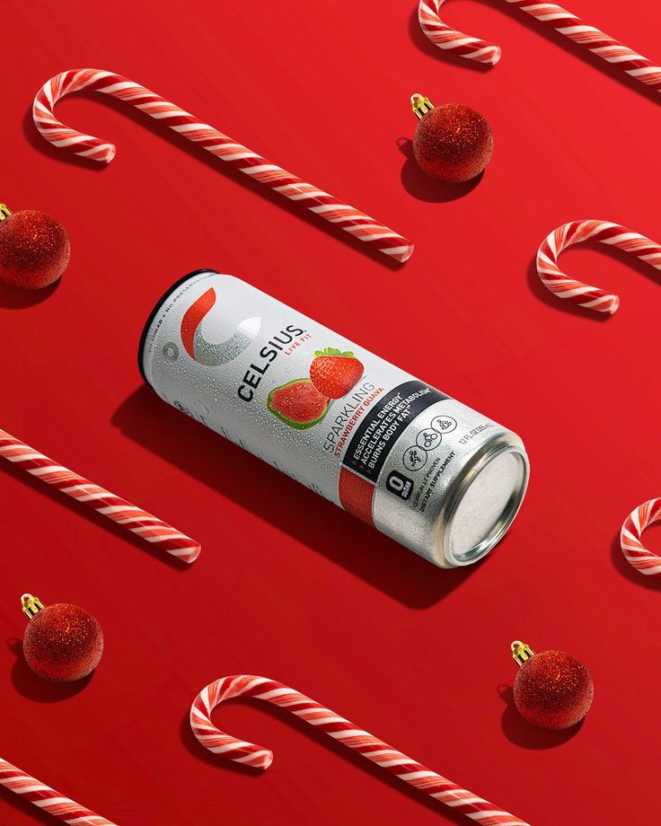 a can of ice cream surrounded by candy canes