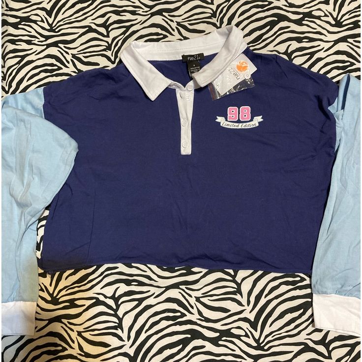 Nwt Juniors Rue 21 Cropped Babe 98 Long Sleeve Button Up Shirt Size S 100% Cotton Collared College Style Tops, Collared Tops For College In Spring, Preppy Collared Tops For College, Blue Collared Tops For College, Long Sleeve Summer Shirt For College, Blue Fitted Tops For College, Blue Cotton College Style Tops, Blue Cotton Tops For College, Preppy Long Sleeve Tops For College