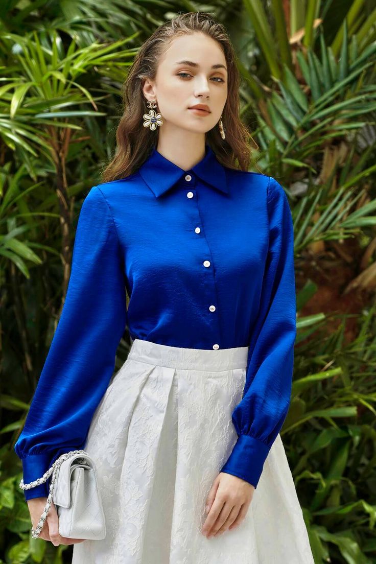 This shirt is the perfect blend of sophistication and practicality. Featuring a bishop sleeved and collared neck, this shirt adds a touch of refinement to any professional outfit. Crafted with high-quality satin for supreme comfort and style, it's essential for any savvy dresser. Cobalt Outfit, Satin Shirt Outfit, Collar Shirts Women, Professional Outfit, Mean Blvd, Ladies Blouse Designs, Fashion Drawing Dresses, Everyday Fashion Outfits, Satin Blouses