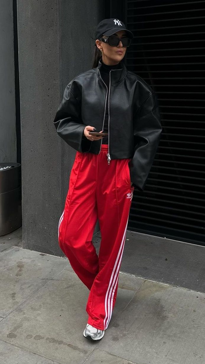 Classy Tracksuit Outfit, Red Sweat Pants Outfits, Red Sneakers Outfit Women Street Style, Jog Pants Outfit, Trackpant Outfit Street Style, Red Joggers Outfit For Women, Red Pants Outfit Winter, Red Track Pants Outfit, Red Pants Outfit Street Style