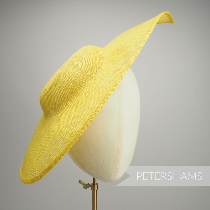 Get Royal Ascot ready with this extra large pointed tip Yellow sinamay fascinator base! Made from a triple layer of stiffened sinamay millinery fabric and is ideal for making an instant hat. This shape has a lovely pointed tip and a shallow crown. Get creative by positioning it at different angles on the head! Just add a headband for securing to the head (not included but available in our shop!) *This is not a fitted hat! You will need to sew in a headband or comb to attach it to your head* Meas Fitted Sinamay Straw Hat With Curved Brim, Fitted Sinamay Boater Hat With Curved Brim, Fitted Sinamay Boater Hat With Flat Brim, Fitted Sinamay Boater Hat With Short Brim, Brimmed Sinamay Fascinator For Church, Fitted Wide Brim Sinamay Straw Hat, Sinamay Fascinator With Curved Brim For Royal Ascot, Spring Fascinator With Sinamay And Curved Brim, Fitted Sinamay Fascinator For Church