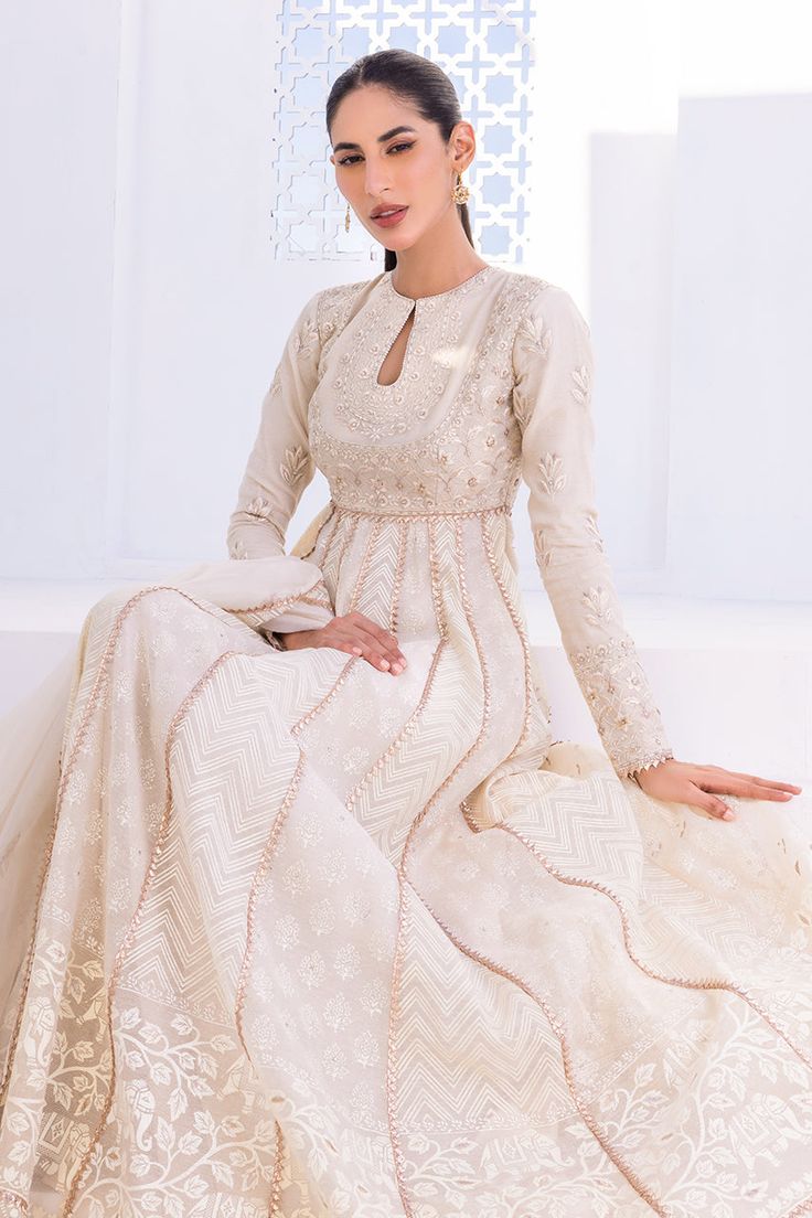 Merkai – Sania Maskatiya International Traditional Chanderi Anarkali Set For Reception, Off-white Churidar With Straight Kurta, Saniya Maskatiya Formal Wear, Chikankari Embroidered Straight Kurta Anarkali Set, Chikankari Embroidered Dola Silk Anarkali With Straight Kurta, Off White Raw Silk Anarkali Dress, Off White Anarkali Dress In Raw Silk, Cream Dress With Cutdana For Diwali, Cream Sharara For Wedding And Eid