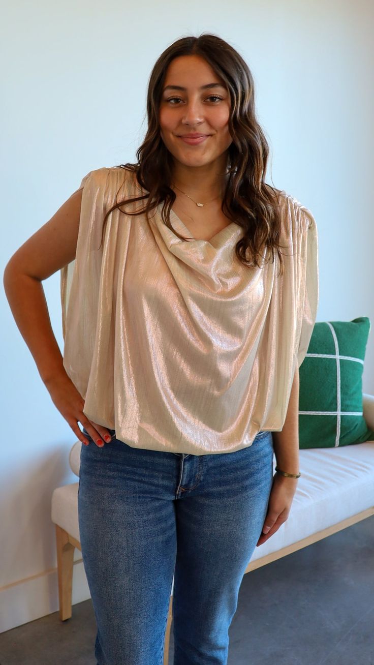 A golden shimmery top that has a sleeveless look. Fit : True to Size Small : 4-6 Medium :8-10 Large : 12-14 Pearl Top, Pearl Accessories, Skirt Jumpsuit, Kids Outerwear, Knit Sweatshirt, Sweatshirt Dress, Personal Shopping, Outerwear Women, Short Tops