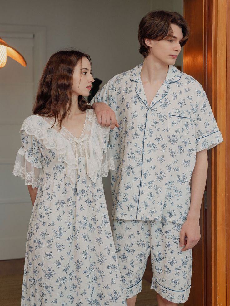 Editor's NotesCut from lightweight fluffy rayon-blend cotton  these are flower patterned romantic couple pajamas.  The men's top is a button-down collared top with a front pocket paired with elasticated banded shorts  and the women's long short-sleeved dress features sheer lace details on the sleeve ends  V-neckline  and near the hem for utmost femininity. MEN'S- Button-down collared top with front pocket- Colored piping finishes on the collars  sleeves  pocket  and shorts' hem- Elasti Womens Long Shorts, Korean Fashion Women Dresses, Mix Match Outfits, Couple Pajamas, Fashion Terms, Myanmar Dress Design, Baby Dress Design, Collared Top, Trendy Dress Outfits