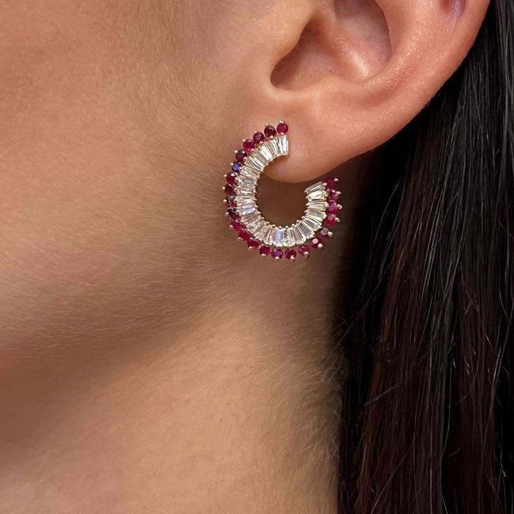 Elevate Your Attire With These Dazzling Hoop Earrings. Crafted In Fine 14k Yellow Gold. These Earrings Feature Prong Set Baguette Cut Diamonds Weighing 2.06 Carats With Round Cut Rubies Weighing 1.89 Carats. Diamond Quality: Color G-H And Clarity Si. Secured With Pushback Closure. Earring Length: 1 Inch. Width: 6.4 Mm. Total Weight: 6.08 Grams. The Earrings Come With A Presentable Gift Box. Id: 02093 Halo Ruby Jewelry, Red Hoop Jewelry For Wedding, Fine Jewelry Red Cubic Zirconia Earrings, Red Cubic Zirconia Fine Jewelry Earrings, White Ruby Round Earrings, Fine Jewelry Red Hoop Earrings, Red Round Hoop Earrings Fine Jewelry, Red Hoop Fine Jewelry, Red Hoop Jewelry For Anniversary