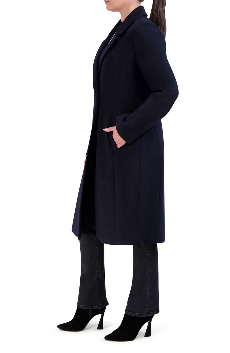 Be perfectly polished in this longline coat elevated in a wool blend with an asymmetric one-button front. 40" length Notched lapels Lined 55% wool, 35% polyester, 5% acrylic, 5% other fibers Dry clean Imported Chic Wool Peacoat For Formal Occasions, Chic Fitted Peacoat For Formal Occasions, Chic Fitted Formal Peacoat, Chic Long Wool Coat For Formal Occasions, Sleek Wool Winter Outerwear, Sleek Wool Outerwear For Winter, Solid Long Wool Coat For Work, Solid Wool Long Coat For Work, Notched Winter Formal Outerwear