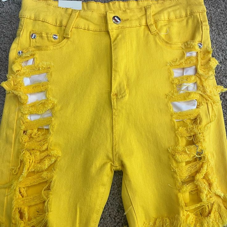 Distress Shorts Yellow Yellow Stretch Short Bottoms, Yellow Stretch Bottoms Of Short Length, Yellow Stretch Bottoms Short Length, Stretch Yellow Bottoms In Short Length, Yellow Stretch Short Length Bottoms, Yellow Wide Leg Jeans For Summer, Ripped Stretch Bottoms For Spring, Ripped Cotton Pants For Summer, Spring Stretch Ripped Bottoms