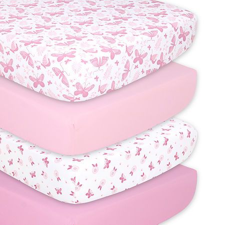 three pink and white mattresses stacked on top of each other in the shape of butterflies