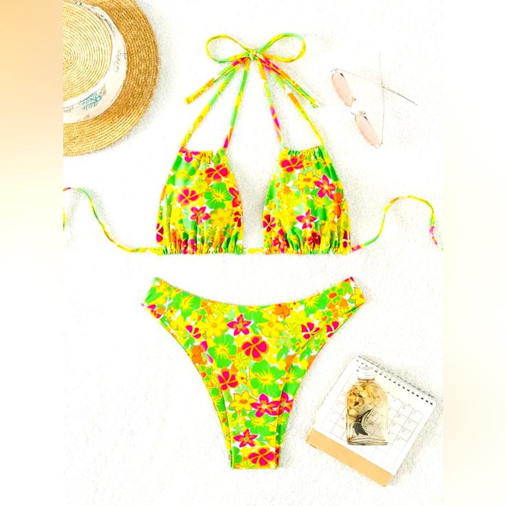 Brand New Neon Floral Bikini 2 Piece Set In A Size Small. Lightly Padded. Perfect Condition & Never Been Worn! #Beach #Bikini #2 Piece #Floral #Colorful #Flowers #Neon #Bikini #Bikini Bottom #Halter Bikini Top #Neck Tie #Tie Neck #Swimsuit #Swim #Swimming #Pool #Vacay #Tropical #Lake #Island #Neon Yellow #Festival #Swimwear #Swim Wear #Bathing Suit #Sexy #Halter Bikini #Hollow Out Halter #Hollow Out Bikini #Bikini Swim Top #Swim Top #Swim Bottom #Swim Bottoms #High Cut #High Rise #Cheeky #Minima Green Tropical Halter Top For Summer, Tropical Green Halter Top For Summer, Orange Beachwear Halter Top For Beach Season, Orange Beachwear Halter Top, Orange Halter Top For Beach Season, Orange Summer Halter Top For Beach, Orange Halter Top For Summer Beach, Orange Halter Top For Beach In Spring, Yellow Halter Neck Top For Vacation