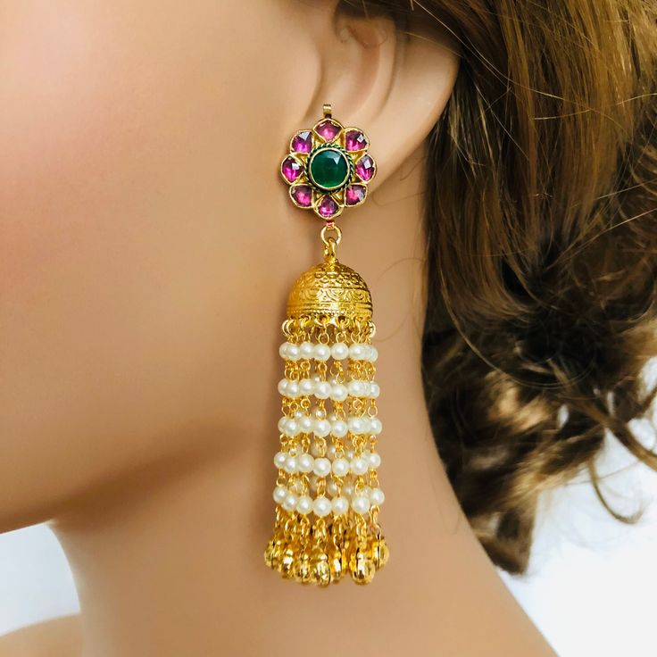 Long Mint Green Meenakari Kundan Earrings/ Pacchi Kundan Chandbali/ Pakistani Chandbali/Indian Bridal Chandbali/Kundan Meenakari Jewelry Description: - Made in Brass with very high quality kundan stones and pearl beads - 22 karat gold finish - Lightweight Earrings - Length: 3.25 inches - Suitable for any traditional occasion or attire - Comes with push back closure Temple Jewelry Style Jhumkas For Eid, Temple Jewelry Jhumkas For Festive Eid, Temple Jewelry Jhumkas For Festive Eid Occasions, Traditional Heavy Jhumkas For Festive Occasions, Traditional Jhumkas For Eid Celebration, Traditional Chandbalis With Latkans For Celebrations, Festive Dangle Jhumkas With Tilla, Dangle Jhumkas For Diwali Festivities, Multicolor Temple Jewelry Jhumkas For Festivals